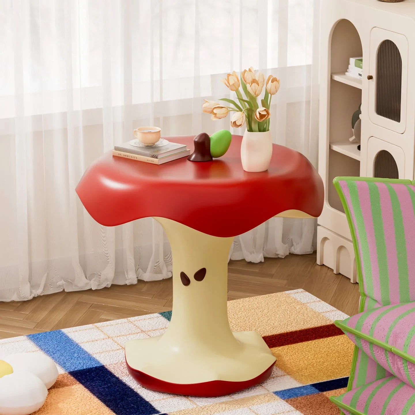 A green Bitten Apple side table adding a pop of color to a room