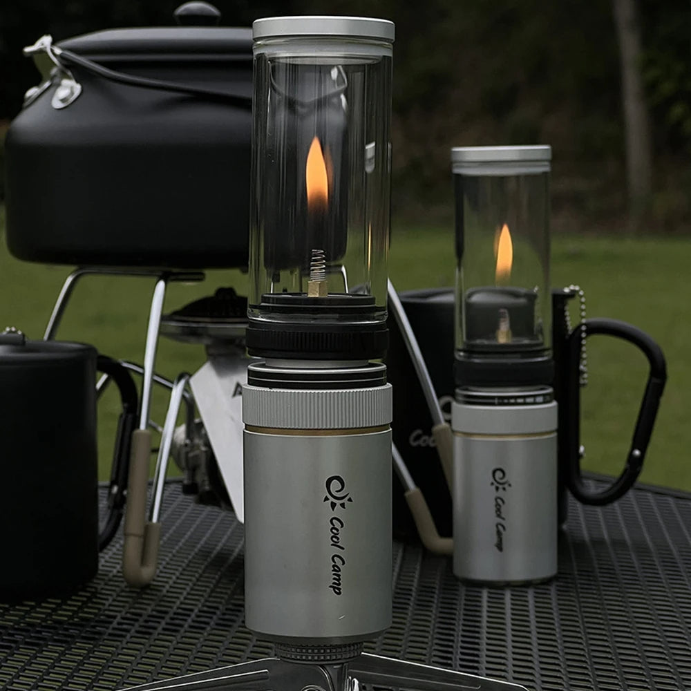 The compact modern lantern next to its fuel tank