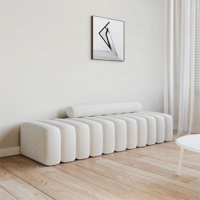 Chic Nordic style upholstered ottoman bench in a modern hallway