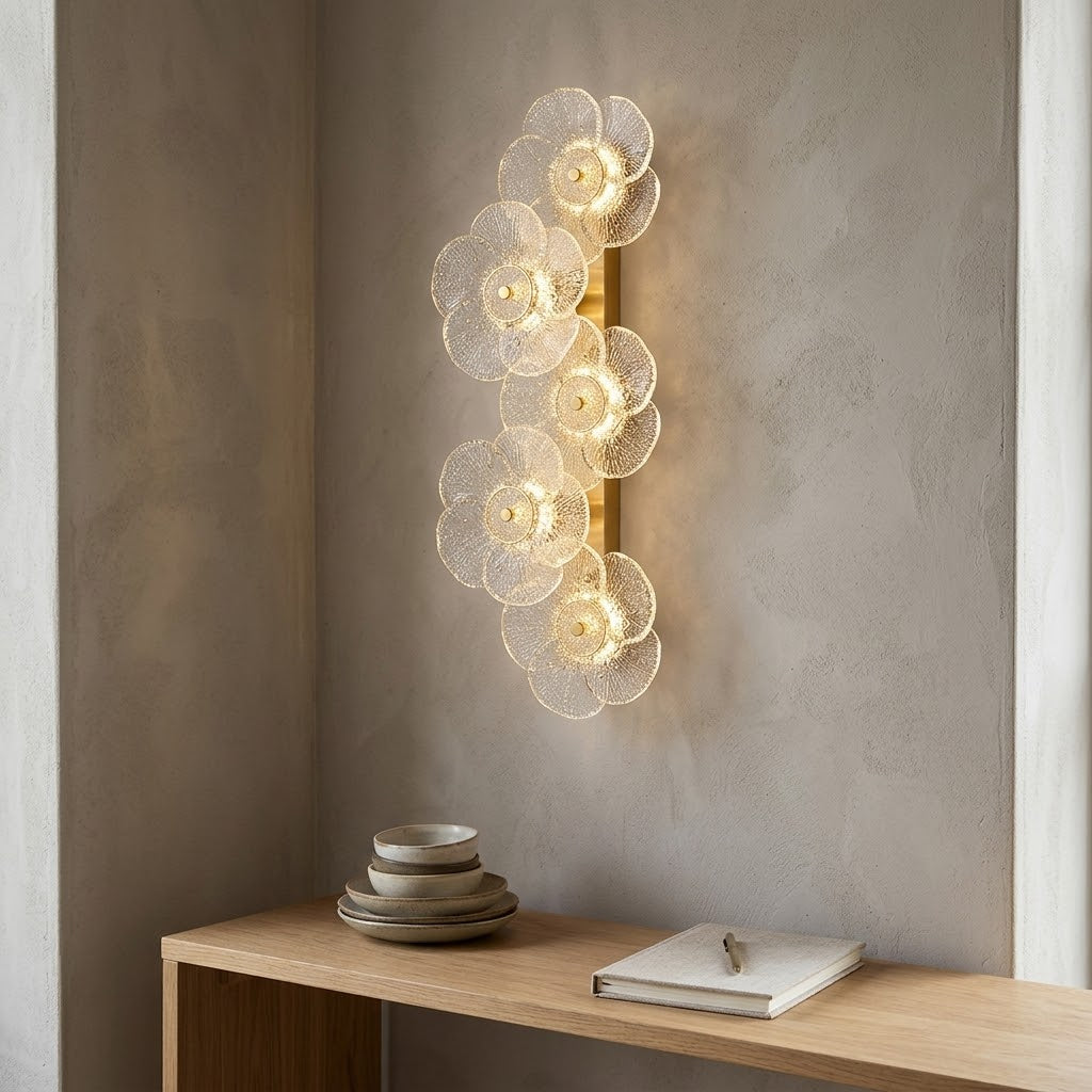 Bloom Light Glass Flower Wall Lamp illuminating a modern bedroom