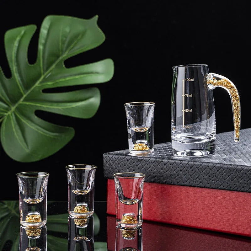 Elegant Sparkling Golden Handcrafted Drink Glasses Set on display