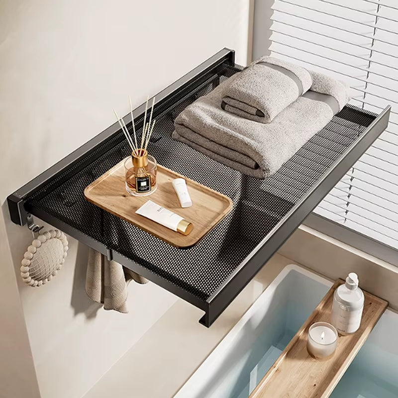 Expandable towel storage organizer rack showing its full length.