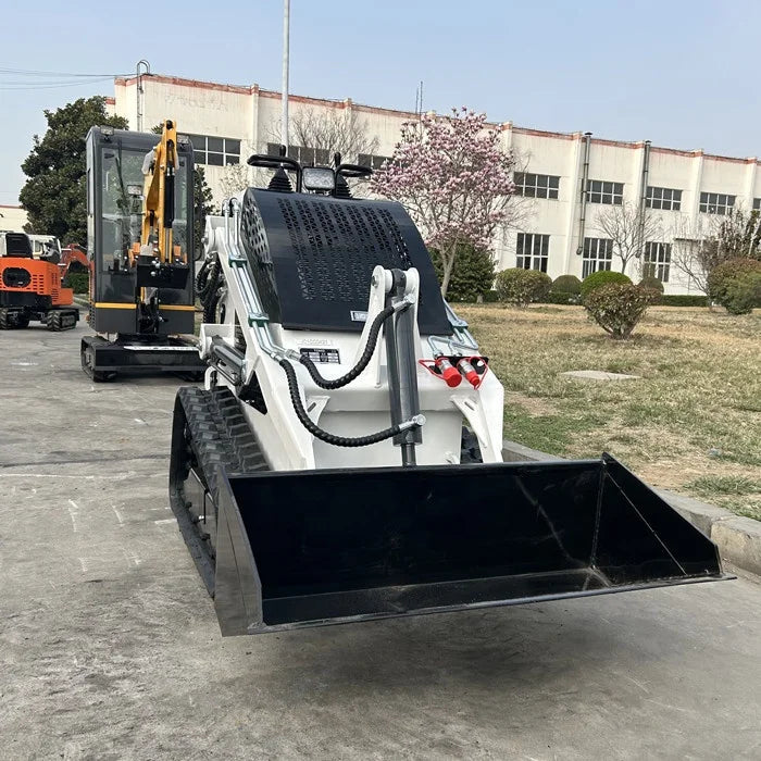 Detailed view of the loader's track system for all-terrain stability