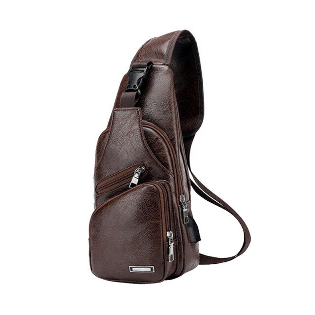Man in a city environment using the Men Leather Crossbody Bags