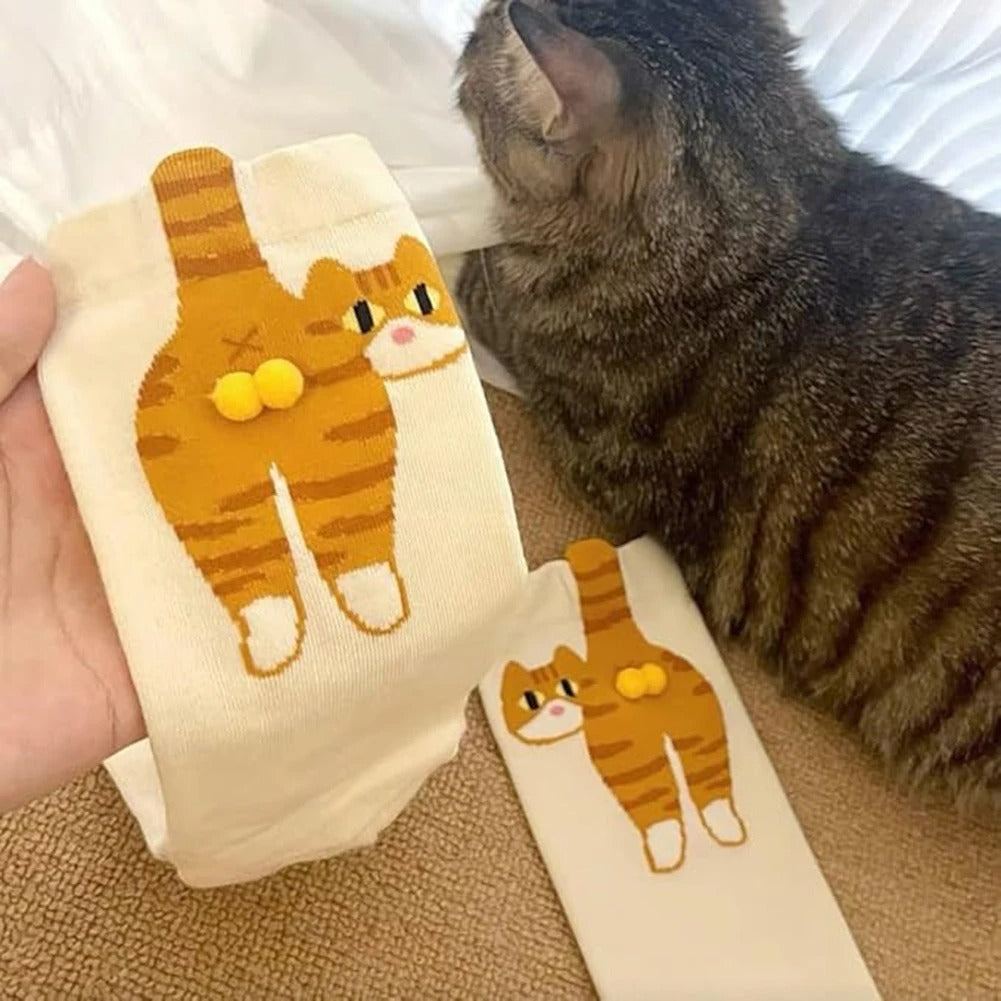 Detailed view of the cute cat butt design on the cartoon socks
