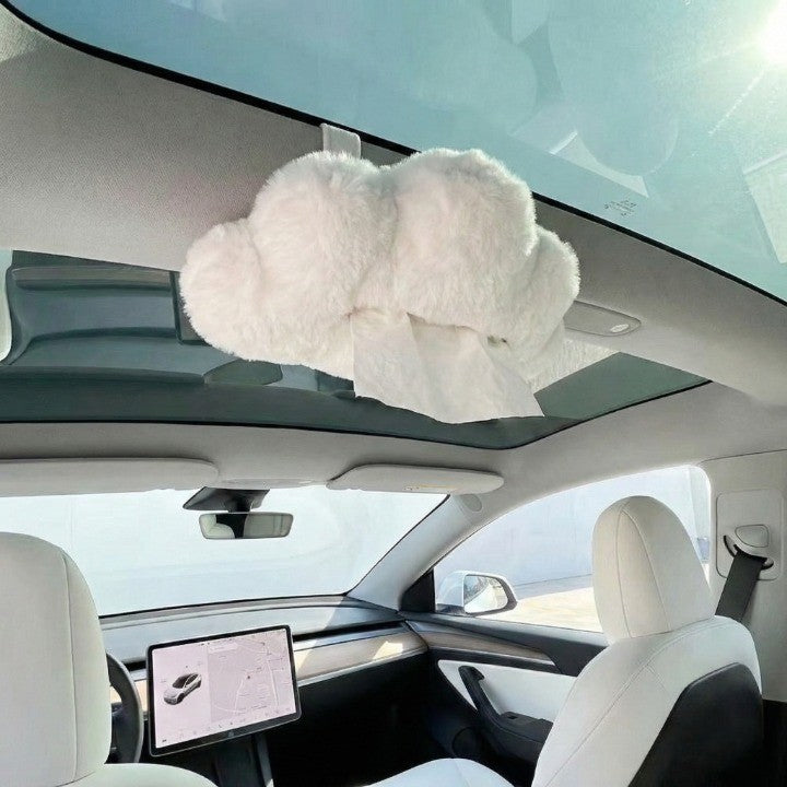 Plush cloud shape car tissue box hanging from a sun visor