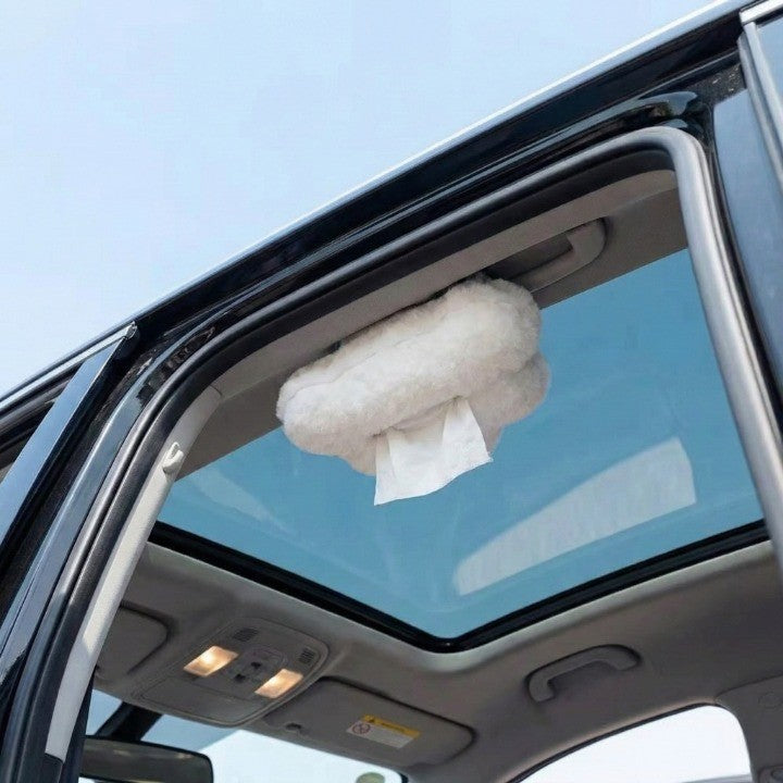 A close-up shot of the soft plush material of the cloud tissue holder.