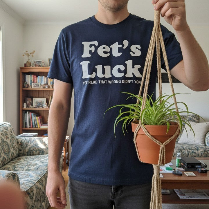 Front view of the Fets Luck Funny T-Shirt with bold text