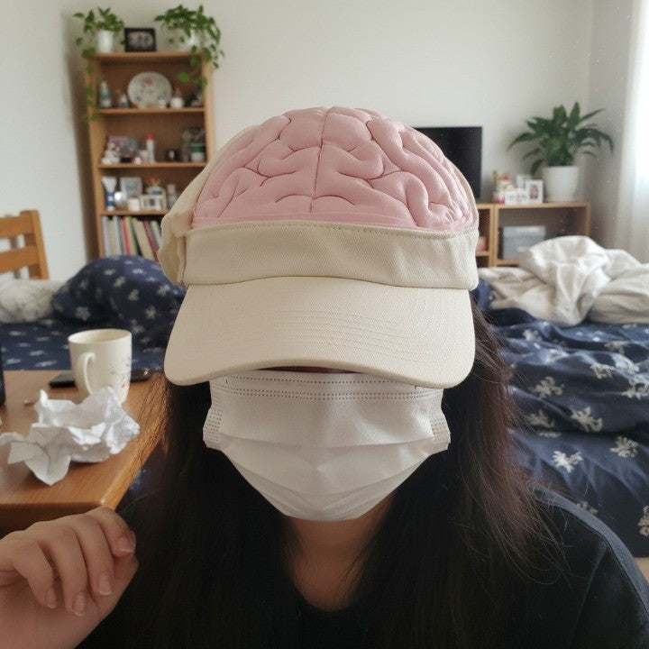 A fun and creative gift idea for a friend wearing the brain hat