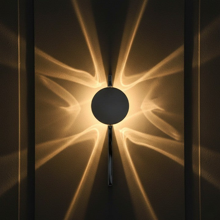 Modular Glow Projection Modern Wall Light casting a radiant pattern on a wall