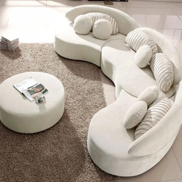 Elegant grey curved modular sectional sofa with luxurious upholstery