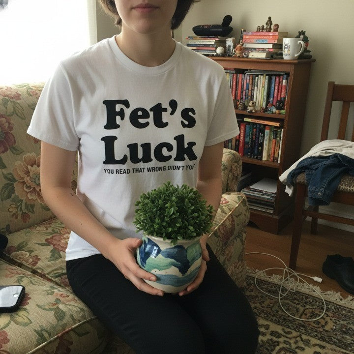 Close-up on the soft, comfortable cotton fabric of the Fets Luck shirt