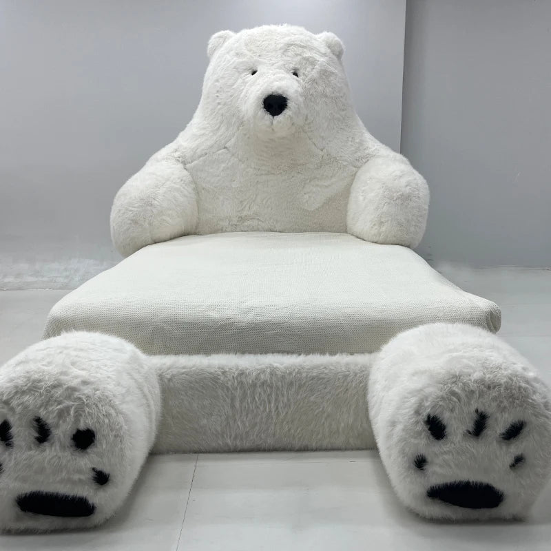 The giant polar bear bed as a centerpiece in a cozy bedroom