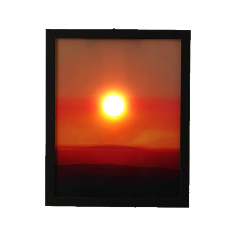 Sunset lamp creating a calming atmosphere in a bedroom