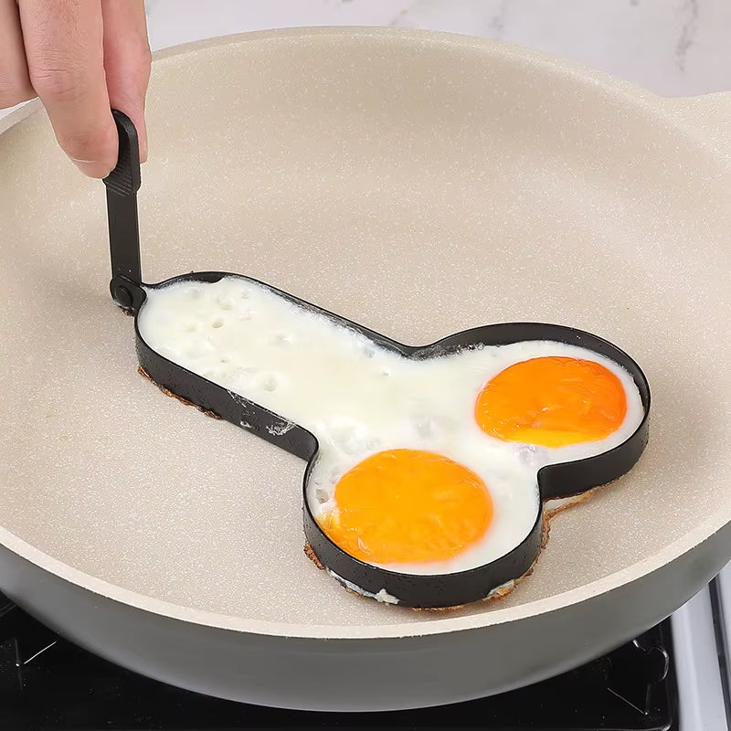Funny adult-theme egg frying mold with a perfectly cooked egg