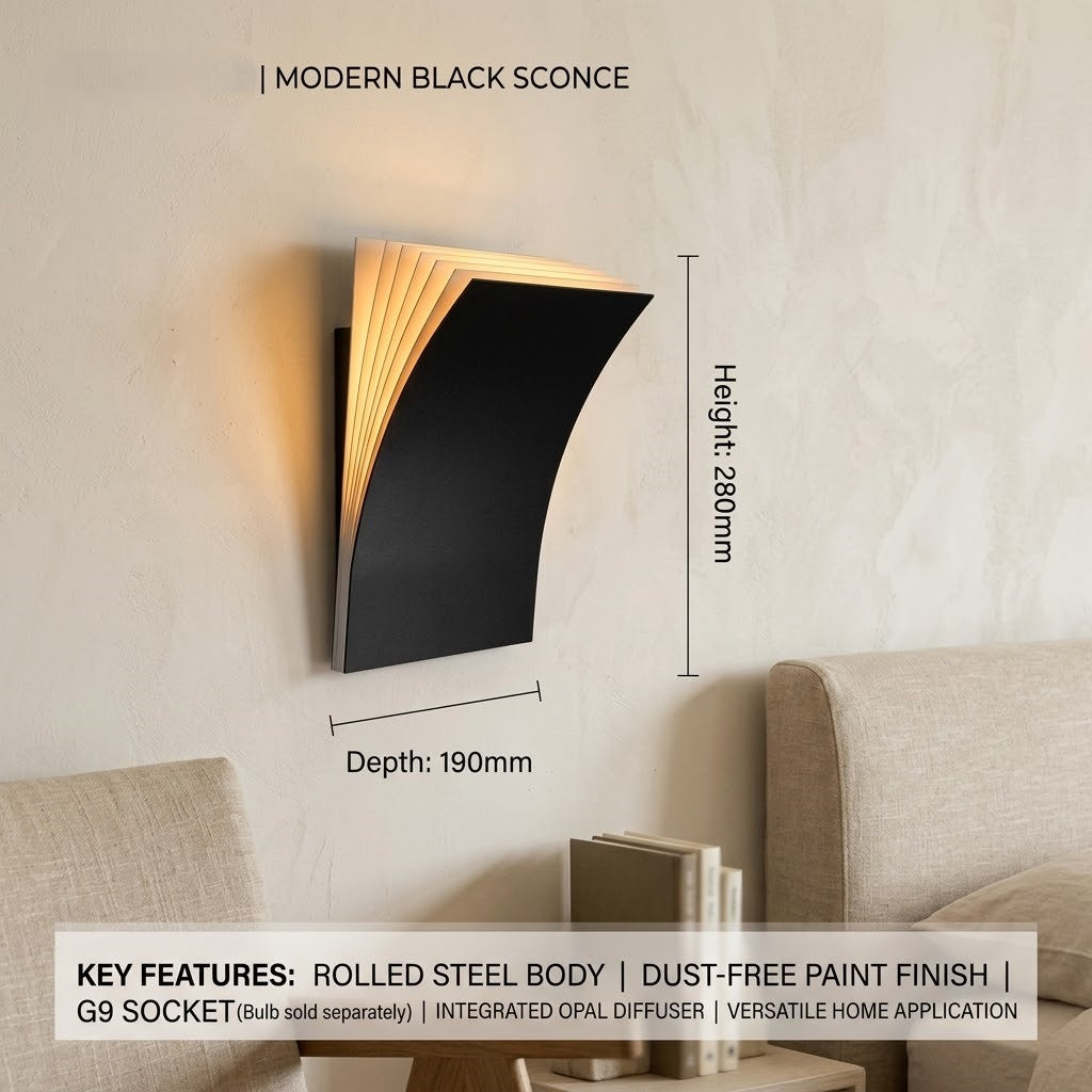 Side view of the book-shaped sconce showing its ambient upward glow