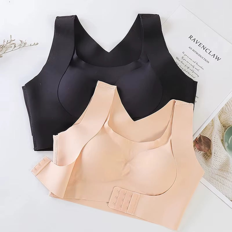 Woman demonstrating the supportive fit of the Cross Back Posture Corrector