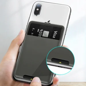 Slim adhesive card holder wallet attached to the back of an iPhone