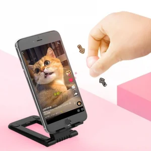 Person wearing a sleek smart ring to remotely control their smartphone functions