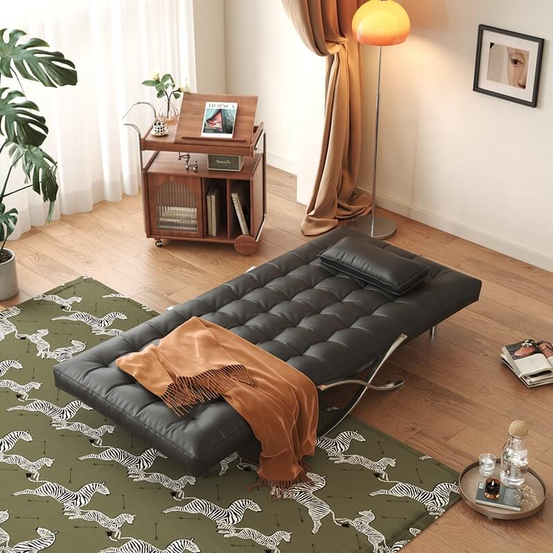Convertible sofa fully extended into a comfortable guest bed