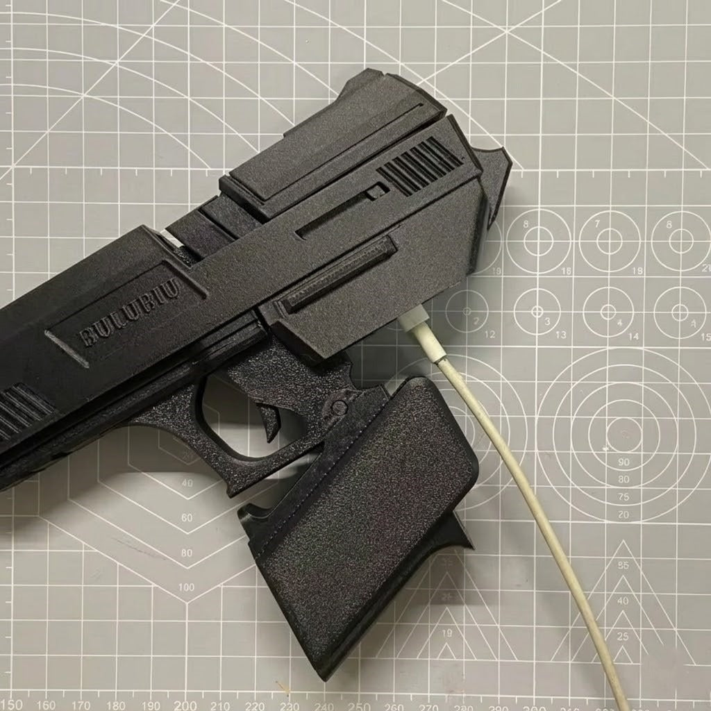 A person holding the unique gun-inspired AirPods case