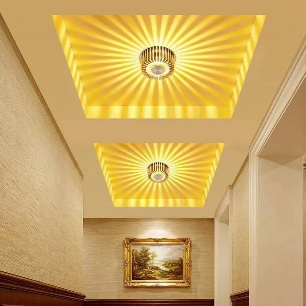 Sunburst Art LED Ceiling Light with a warm white glow on a textured wall