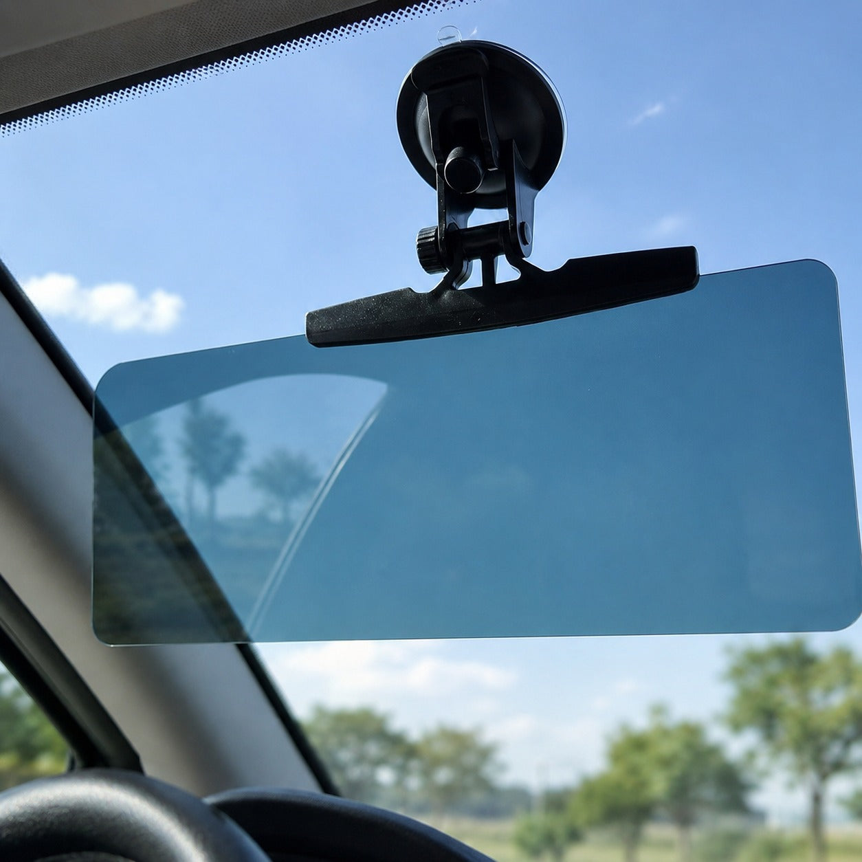 The sun visor extension providing targeted shade inside a car