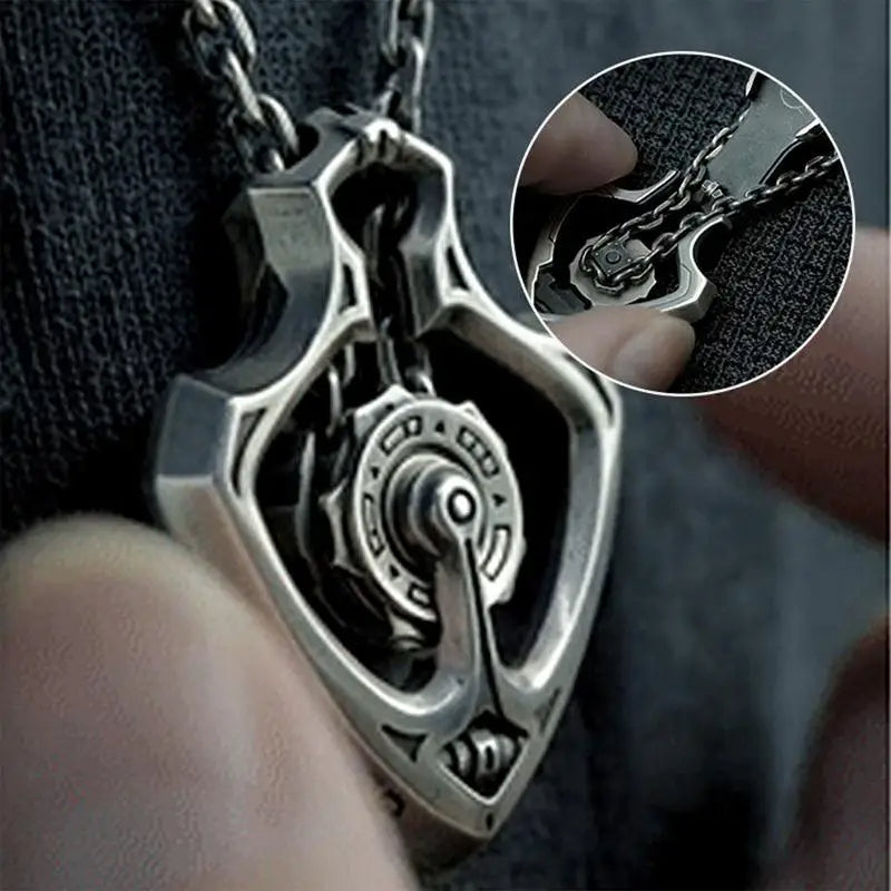 Detailed shot of the mechanical necklace on a textured surface