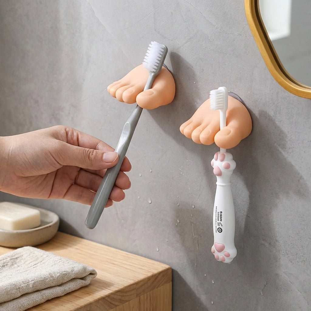 Toe-Grip Wall Toothbrush Holder attached to a bathroom wall