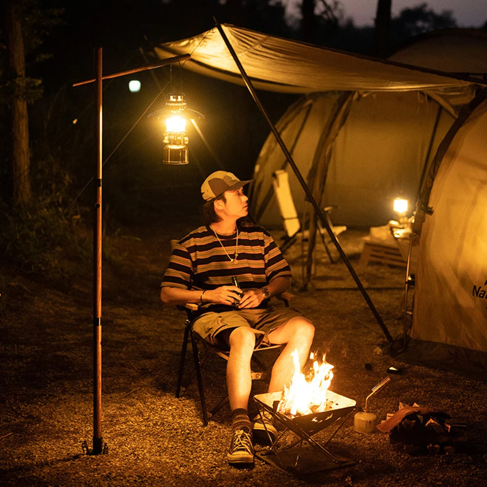 The outdoor lantern illuminating a dark outdoor setting