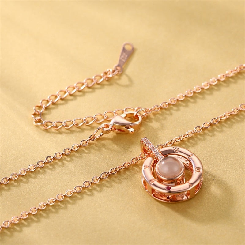 Detailed view of the intricate pendant on the I Love You necklace