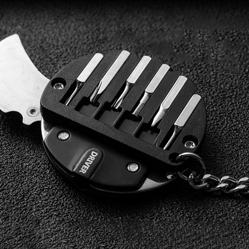Compact mini hiking survival tool held in hand for scale