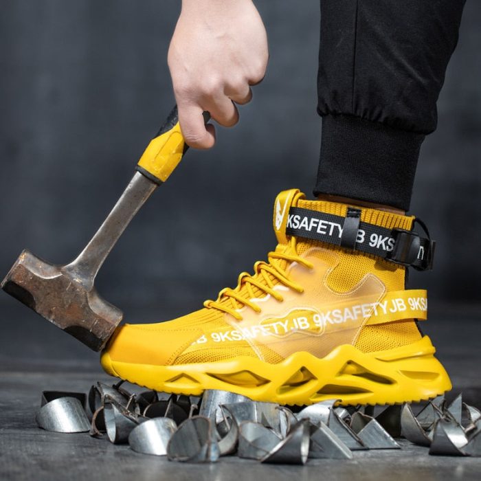 Rugged black anti-fatigue industrial winter boots with yellow laces for cold weather protection