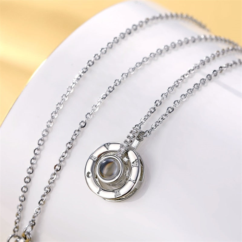 Woman wearing the beautiful and delicate romantic projection necklace