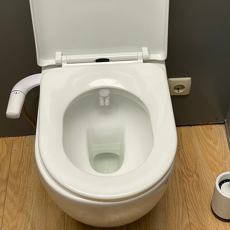 Close-up of the sleek bidet spray nozzle highlighting its quality design