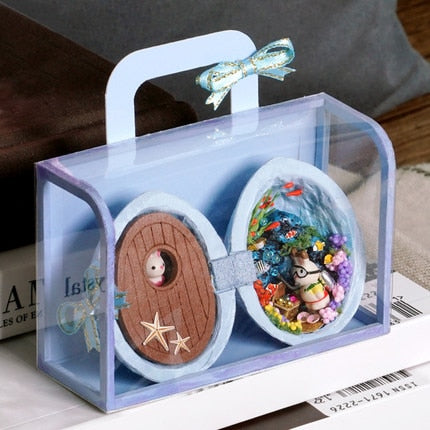 The DIY kit components of the handmade wooden miniature walnut dollhouse