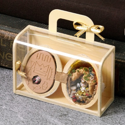 Close-up of the detailed miniatures inside the handmade wooden dollhouse
