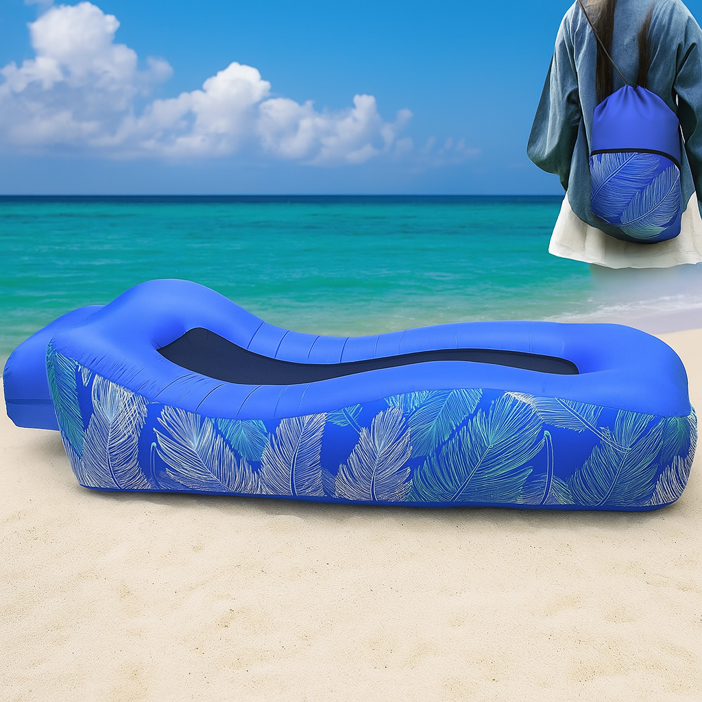 A person relaxing on the Inflatable Portable Outdoor Air Lounge at the beach.