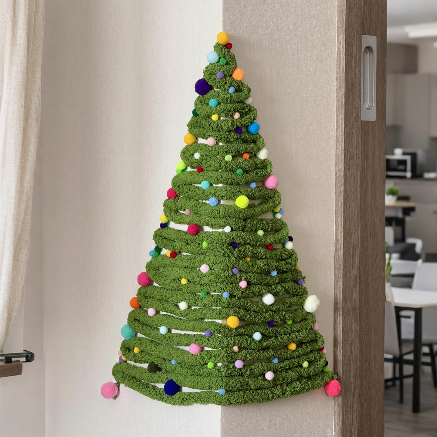 Close-up of the soft felt and yarn materials of the corner Christmas tree