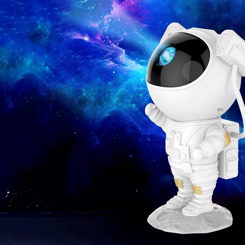 Galaxy Astronaut Night Light Projector casting a nebula on a wall