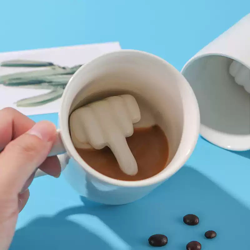 Lifestyle image of the funny ceramic mug on a table