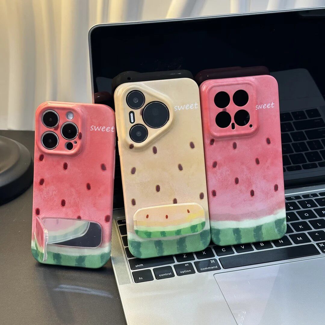 Juicy Shell Mirror Watermelon iPhone Case on a surface