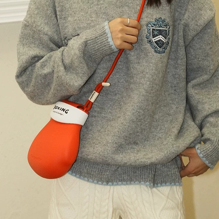 Styling the Ready to Fight Boxing Gloves Mini Bag with a casual outfit