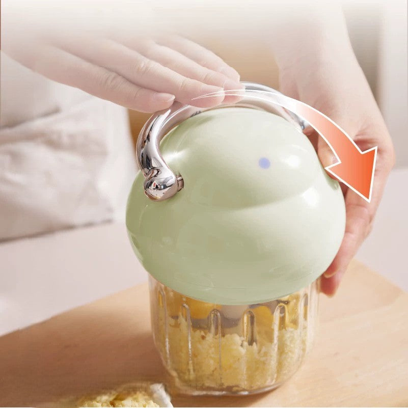 The detachable parts of the cordless mini chopper, showing its easy-to-clean design.