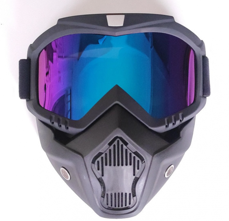 Close-up of stylish windproof motorcycle and snowboard helmet goggles with clear lens.