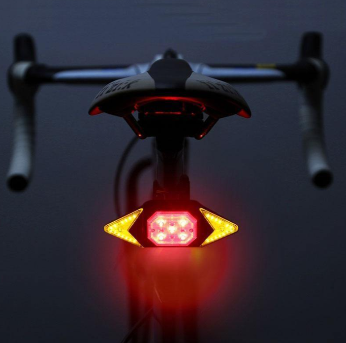 Smart remote control bike turning light with bright LED signals, indicating a turn.