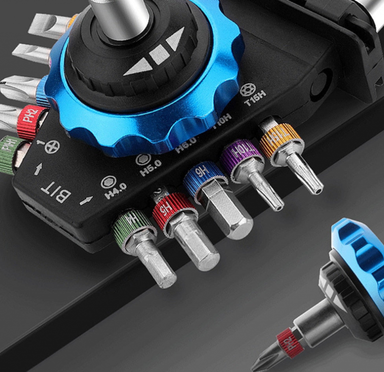 Compact portable magnetic mini screwdriver set with various interchangeable bits.