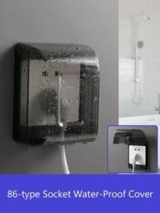 Bathroom Waterproof Large Transparent Socket Protective Box covering an outlet