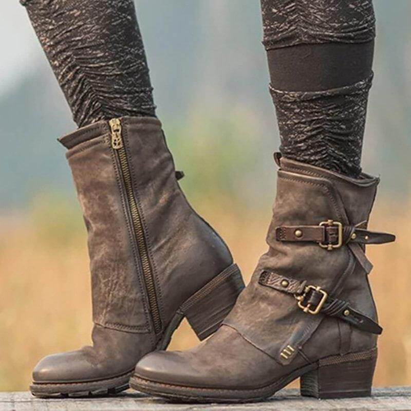 A person wearing the punk style ankle boots with jeans
