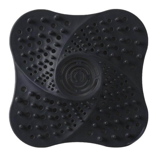 Demonstrating the easy placement of the drain hair catcher in a tub